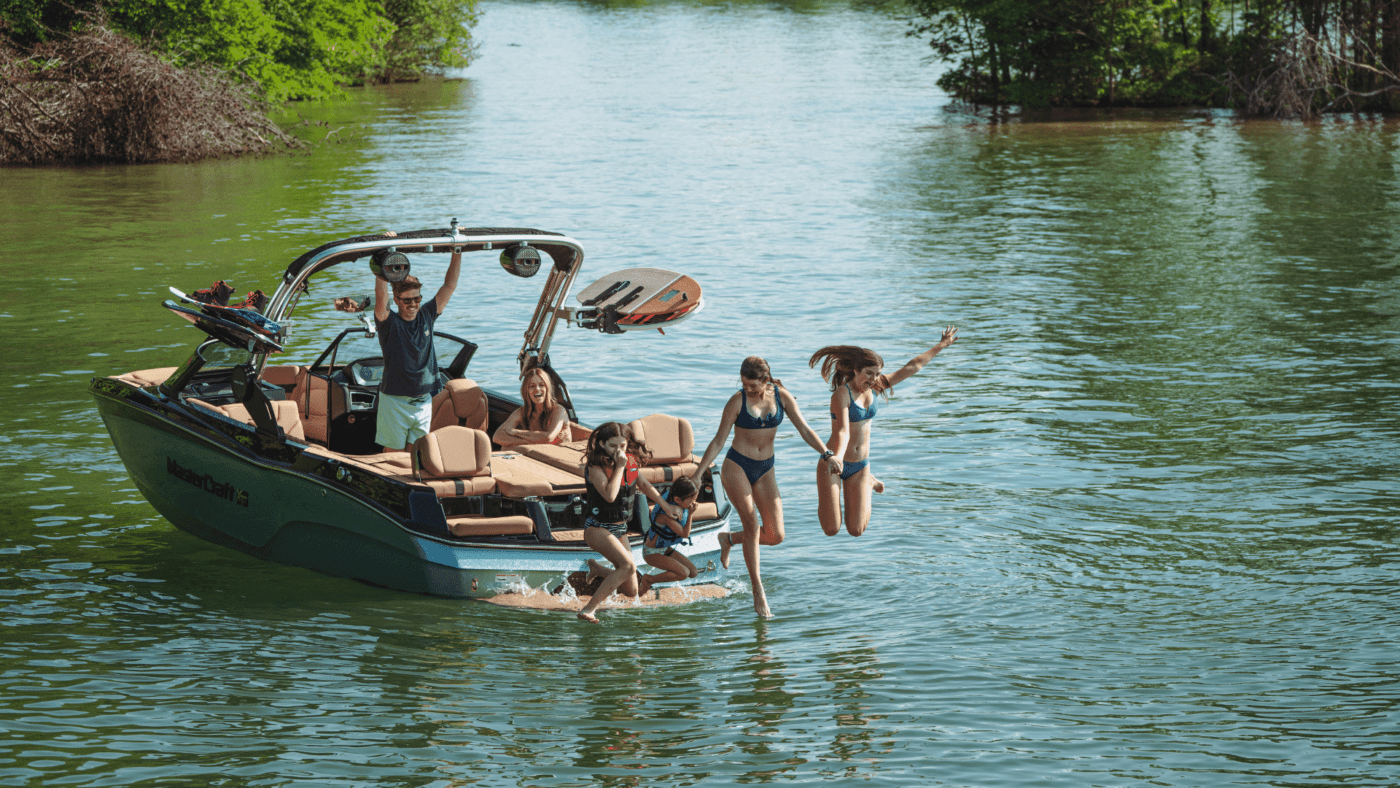 2023 MasterCraft Boats XT23 - Jumping in the lake. 