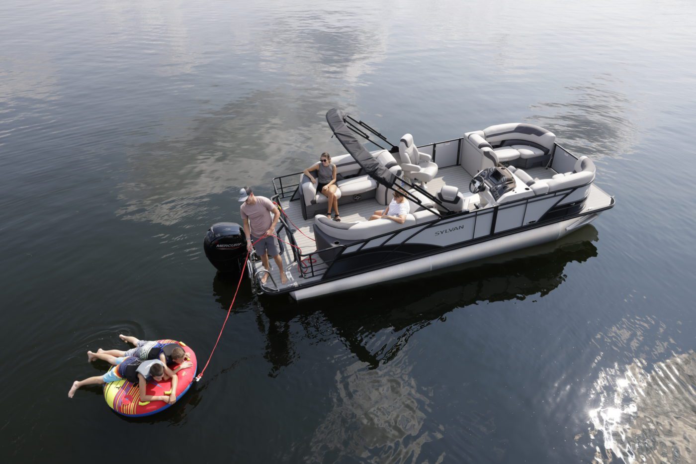 Sylvan Pontoon with a family on the water. Sold out of our Atlanta Marine.