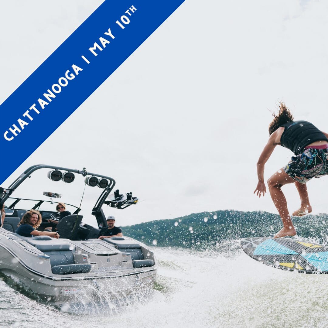 A wake surfer behind a 2025 MasterCraft wake boat