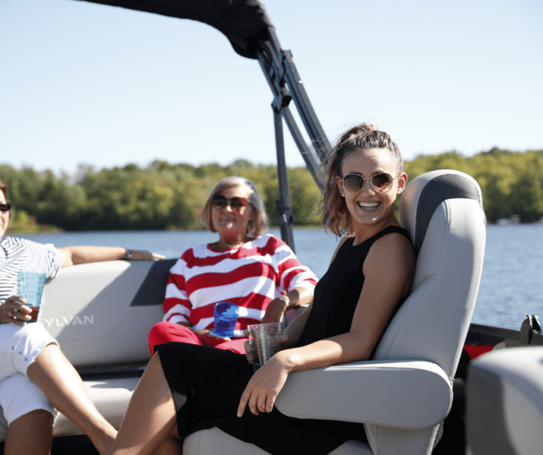 Women enjoy cruising on a Sylvan Pontoon