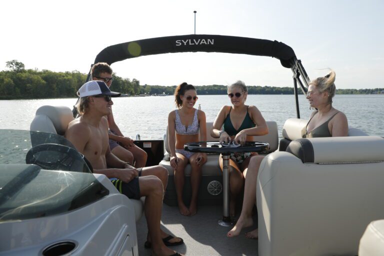 A group of friends aboard a Sylvan Pontoon