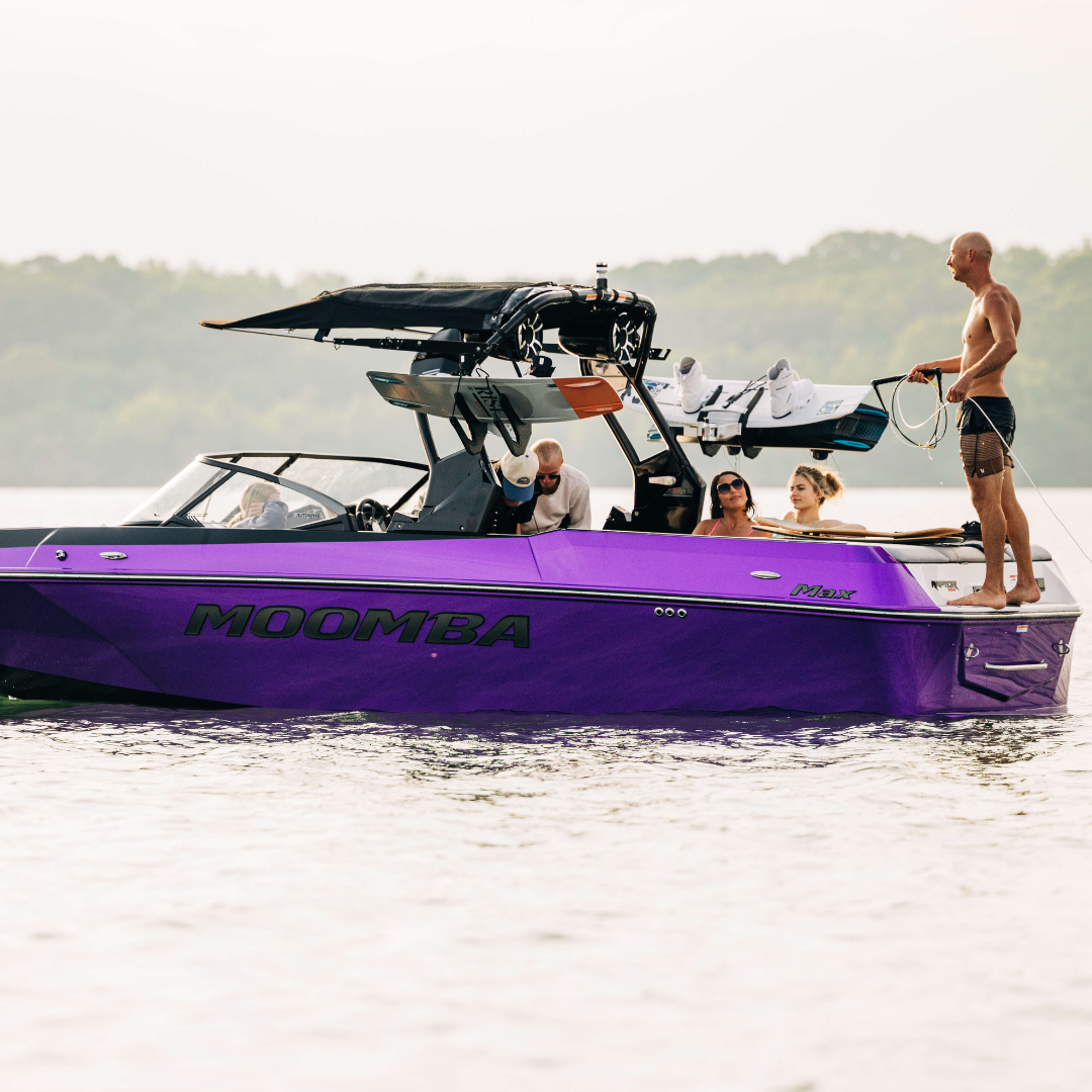 Friends get ready for a day on the water in a Moomba Max