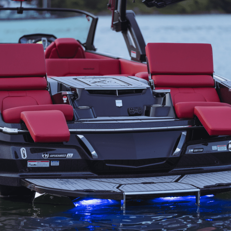 Transom lounge seating on the back of a MasterCraft wake boat.