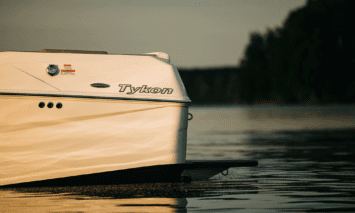 A transom shot of the Moomba Tykon in the water.