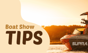 A Supra SA on the water with the sunset in the background with a 'Boat Show' graphic over it.